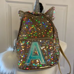 Justice Small Backpack Gold Unicorn with “A”